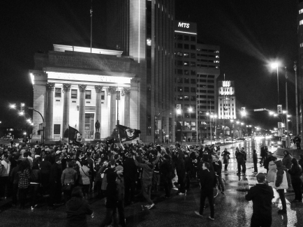 Jets fans closed down Portage and Main last night , celebrating the teams entry into 2015 Stanley Cup Playoffs by emily elizabeth enns